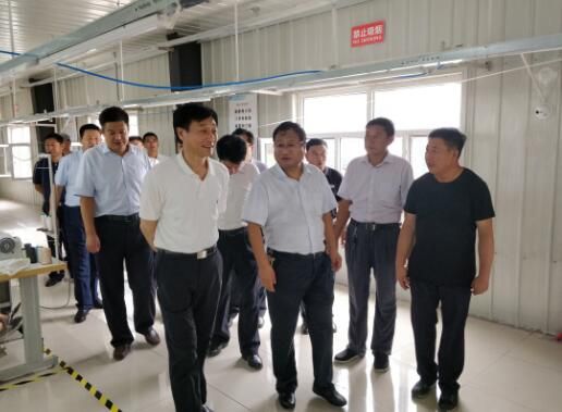 高兵:全力组织实施金融精准扶贫